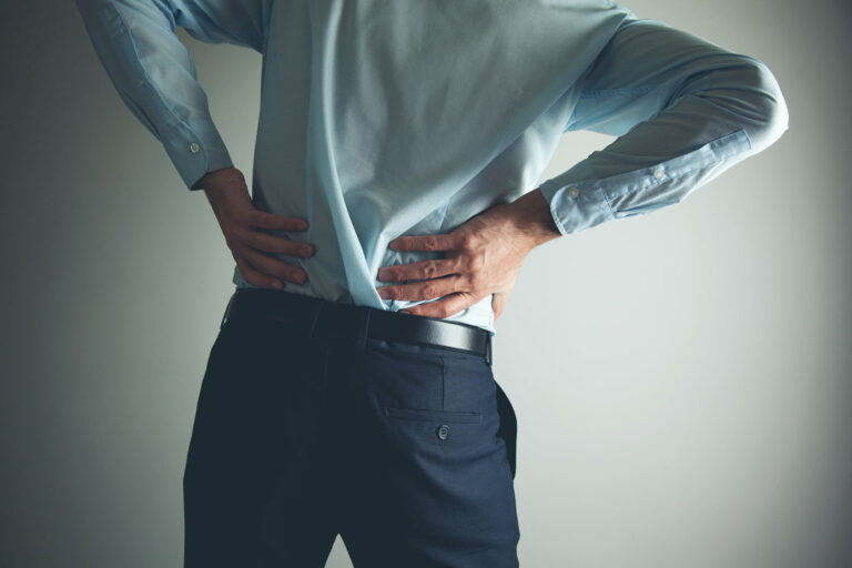 office worker lower back pain https://active-x.co.uk/blog/